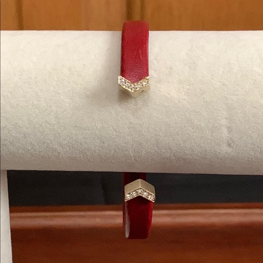 Fossil gold tone & red stainless steel rhinestone cuff